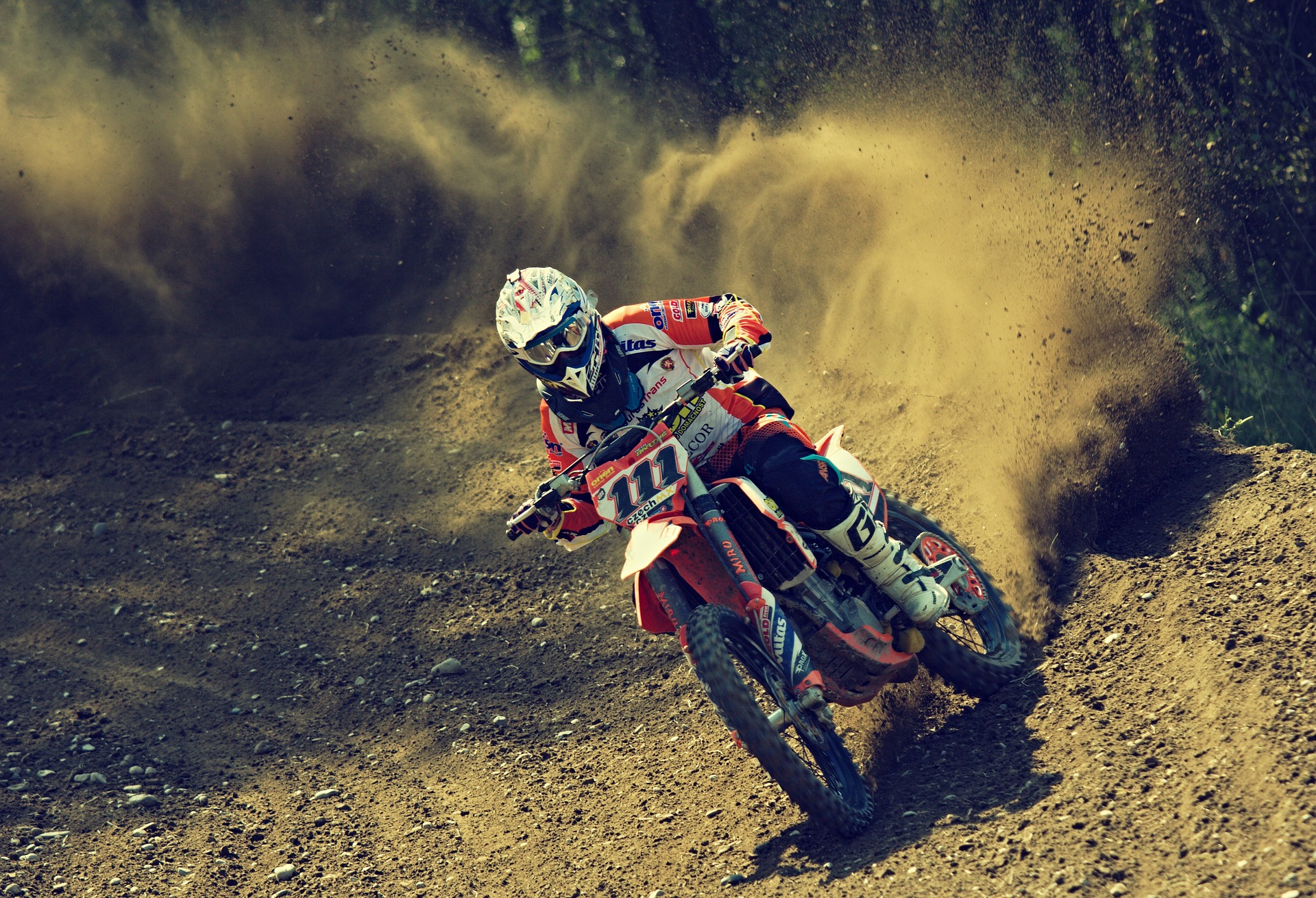 Motocross Rider is using the best dirt bike for adults for the race
