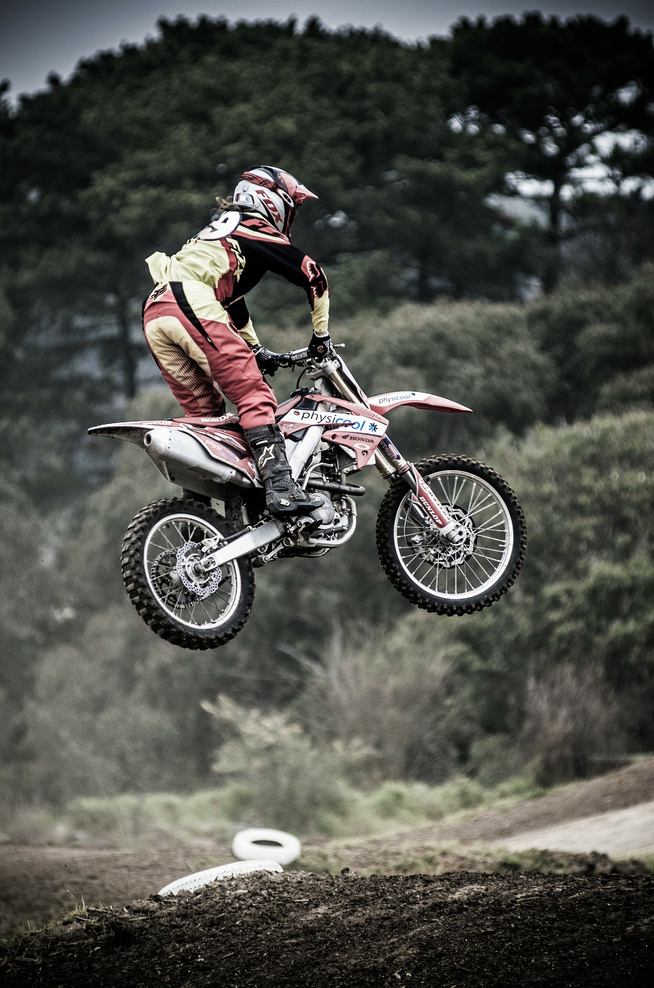 Man riding the best dirt bike for adults for motocross race
