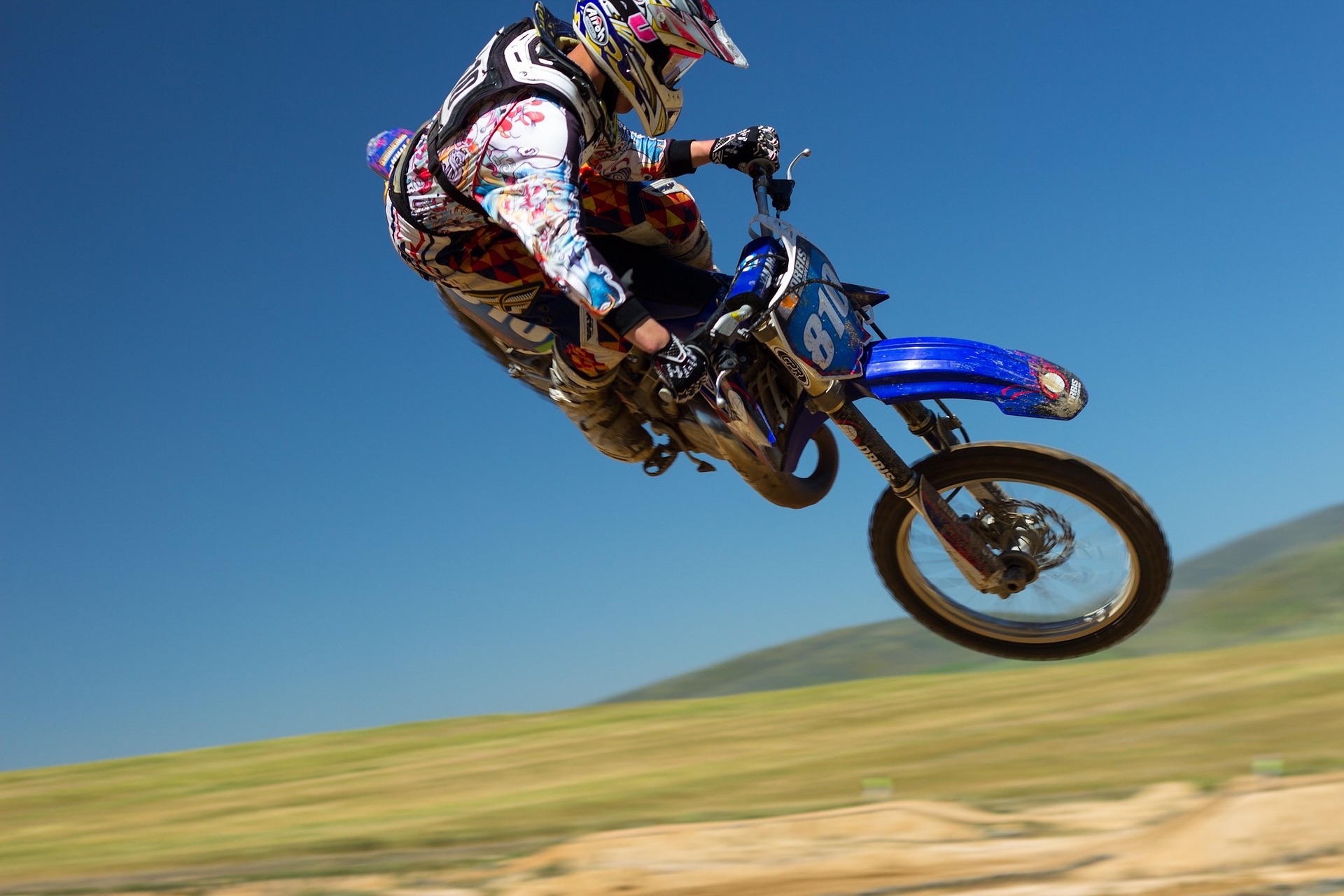 Dirt Bike Racer is showing some tricks in the air