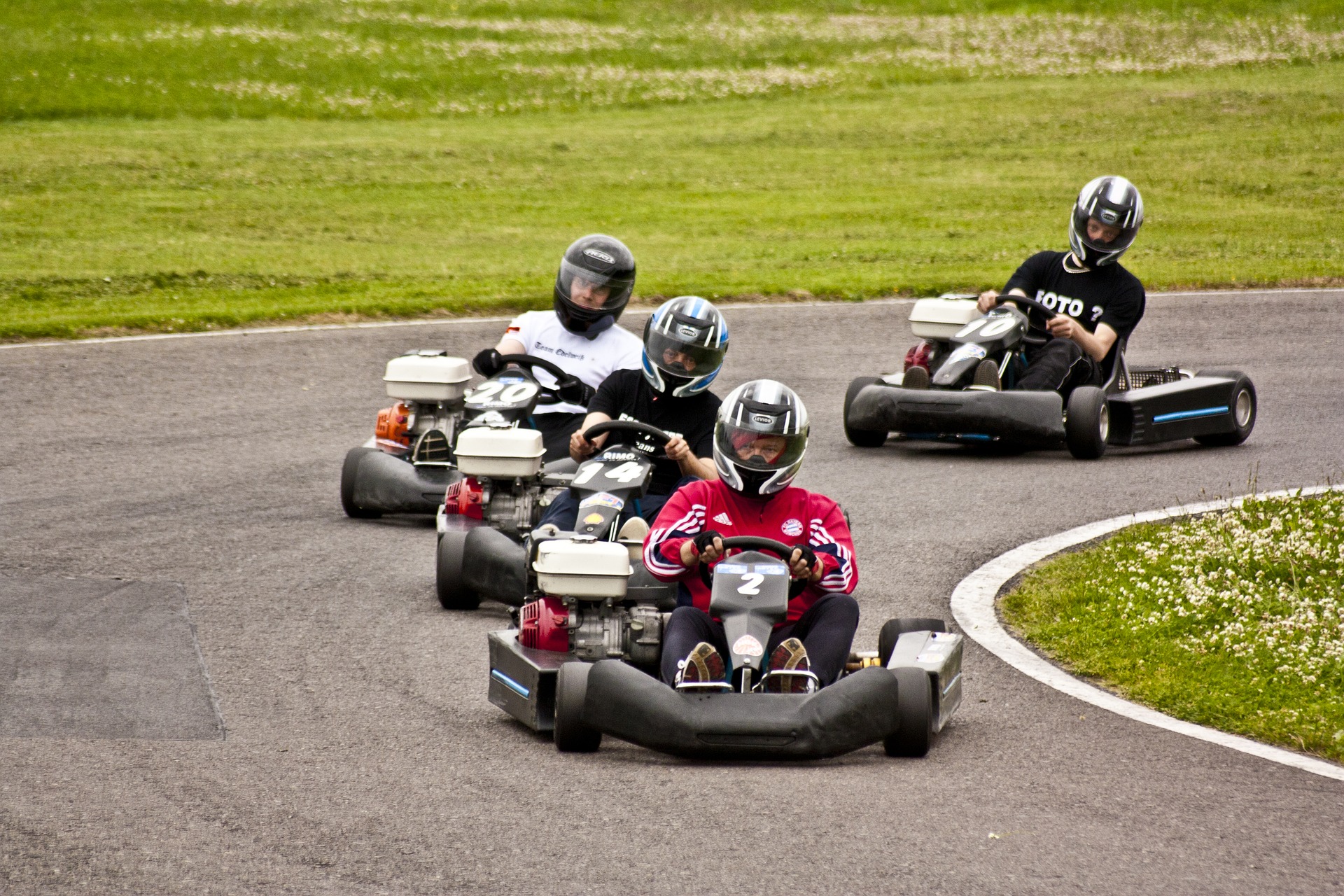 Racing Go Karts and drivers competing to win the race